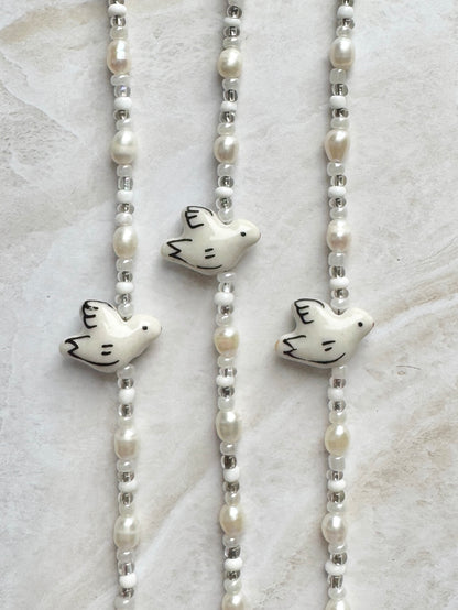 Bracelet "Dove" Freshwater pearl bracelet with bird motif