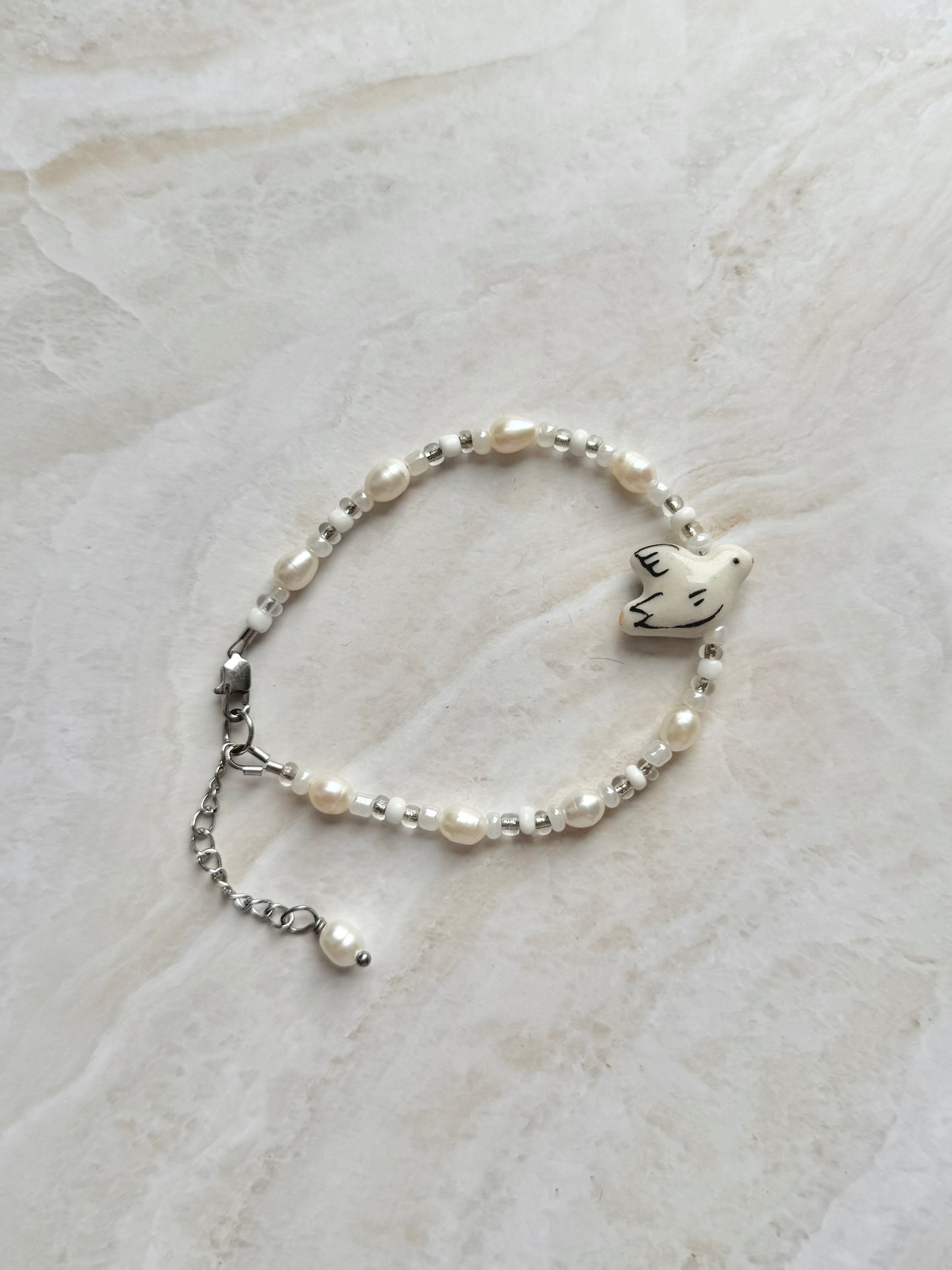 Bracelet "Dove" Freshwater pearl bracelet with bird motif
