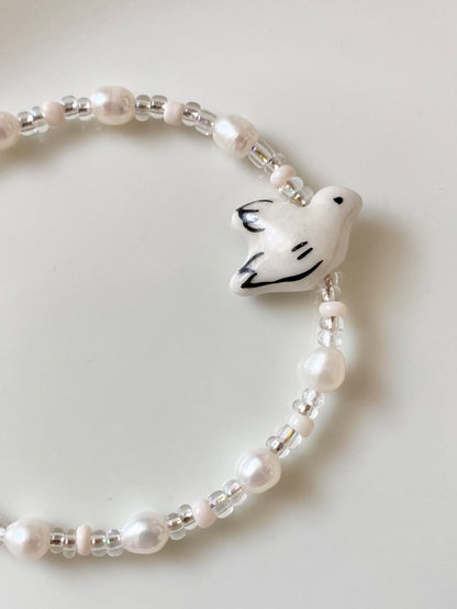 Bracelet "Dove" Freshwater pearl bracelet with bird motif