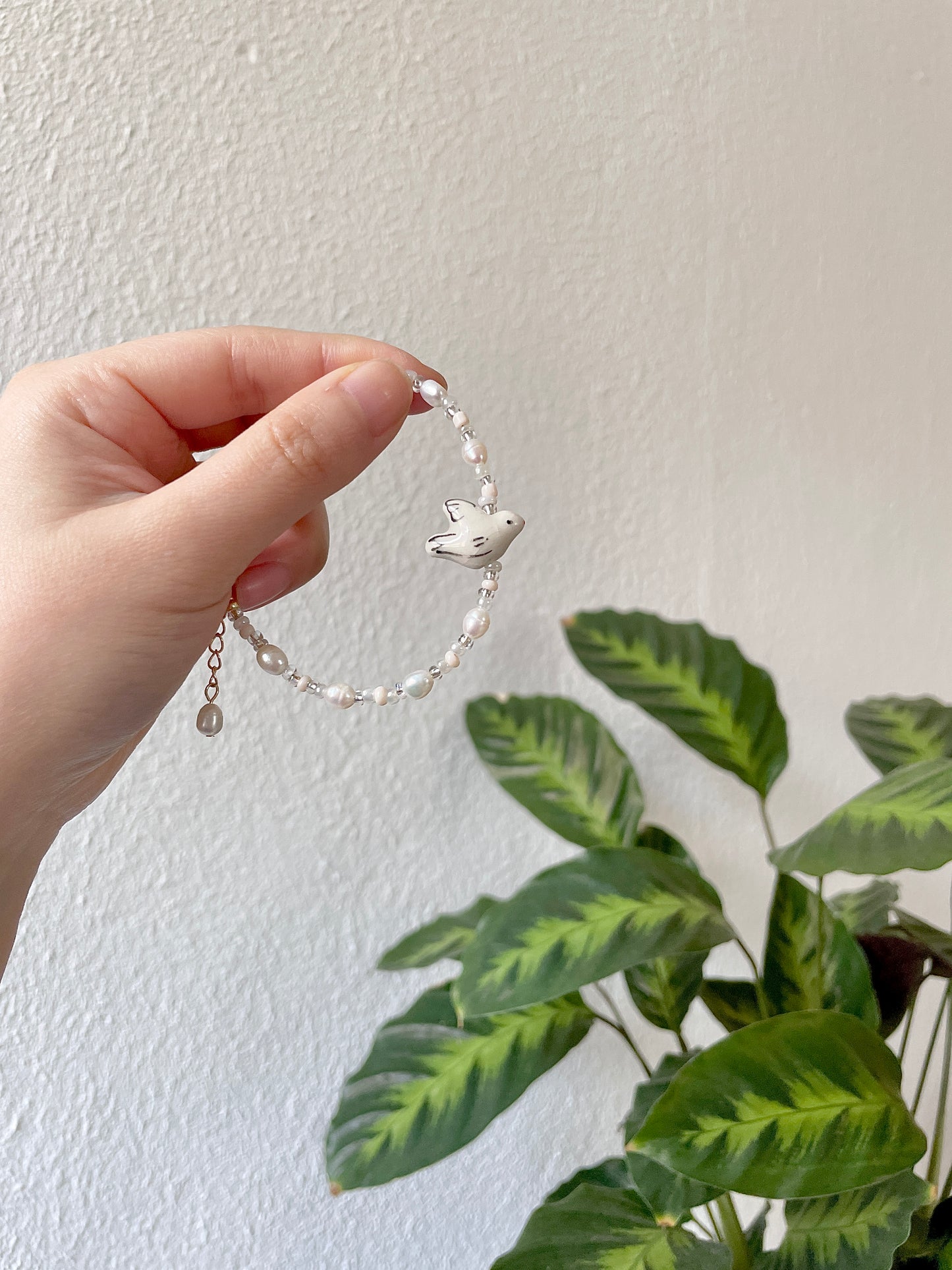 Bracelet "Dove" Freshwater pearl bracelet with bird motif